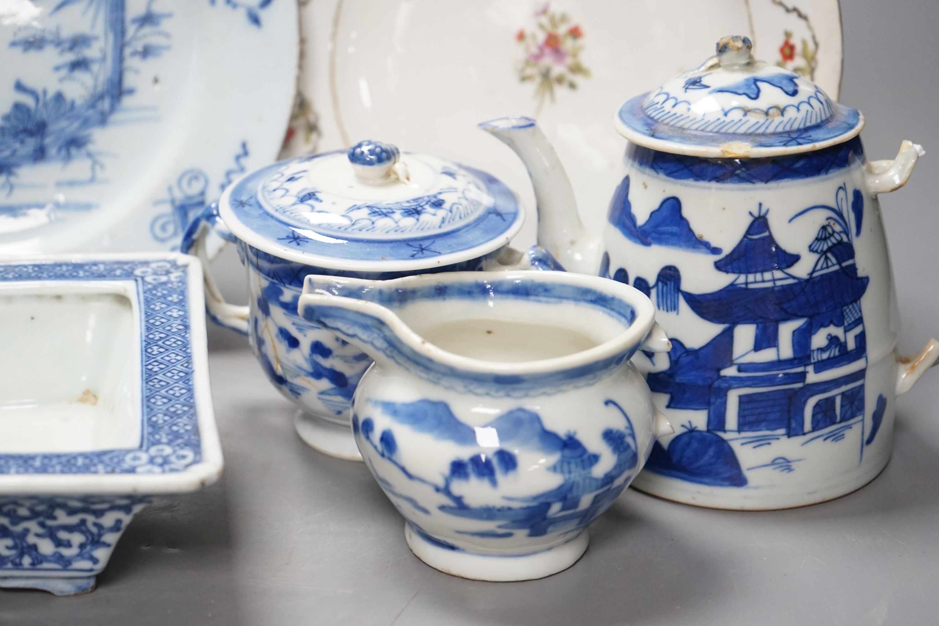 A Chinese blue and white bulb dish and a three piece teaset, a Delft plate and an English porcelain plate, 18th/19th century 23cm